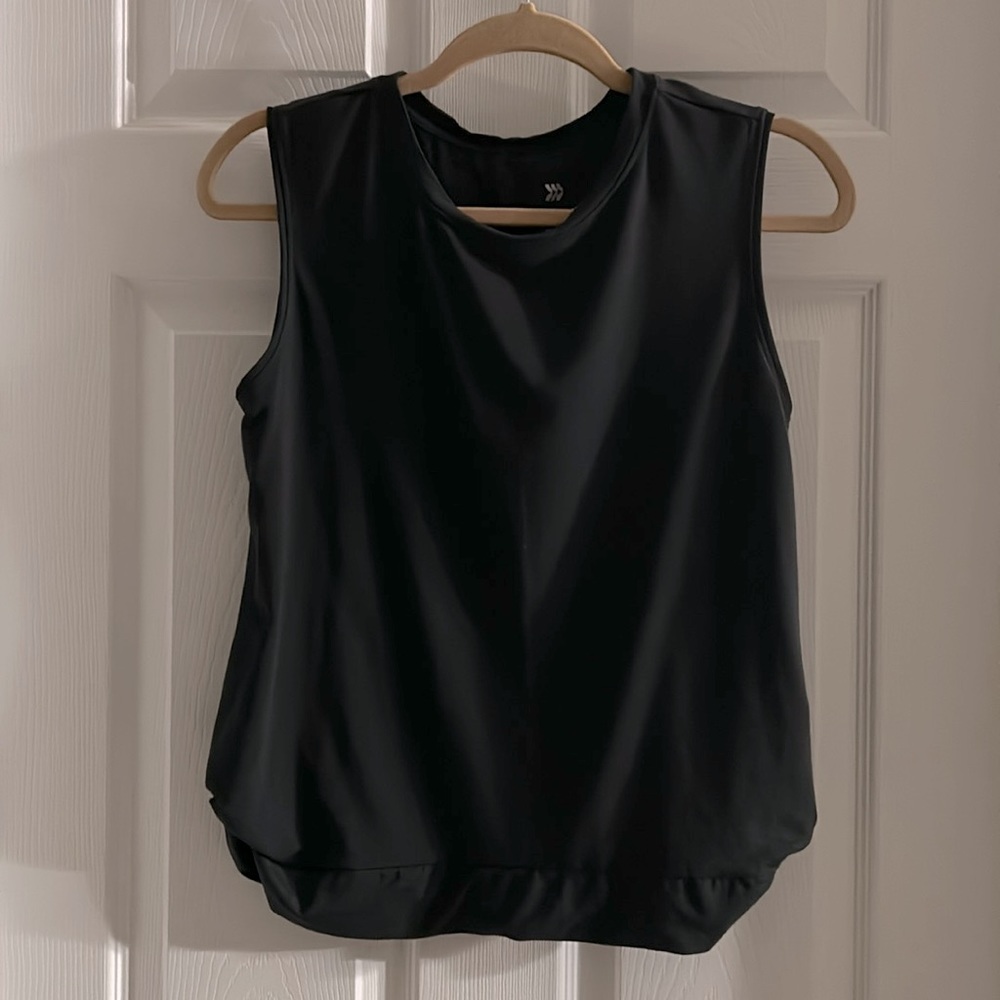 All In Motion size small sleeveless tee with pretty gathering detail on sides